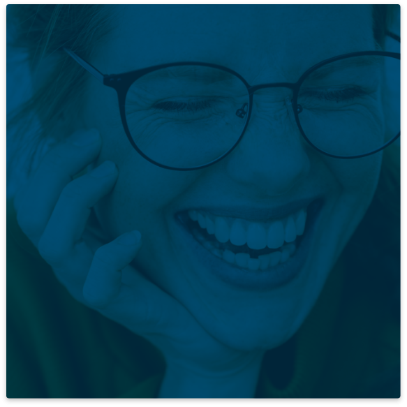 Close up of woman with glasses smiling